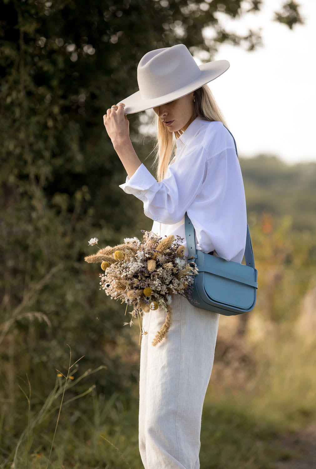 Sac à main en cuir bleu femme